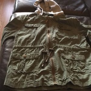 Green jacket with gray hood.